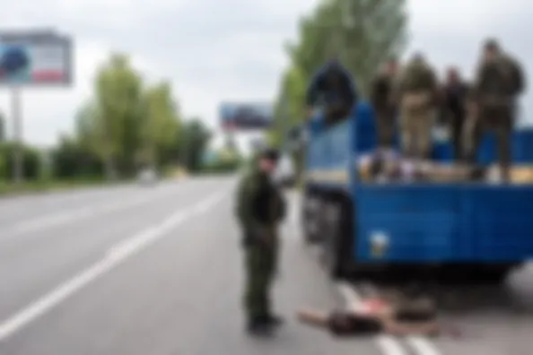 Из архива. Погибший украинский доброволец и ополченцы.
