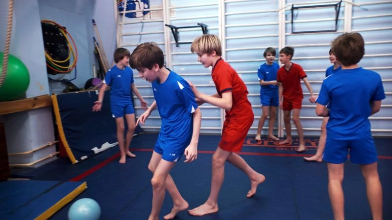 The actors play soccer before filming