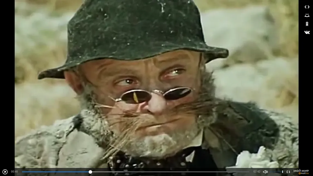 Кот Базилио пытается понять арифметику Лисы Алисы "Пять на два не делится". Скриншот из фильма.